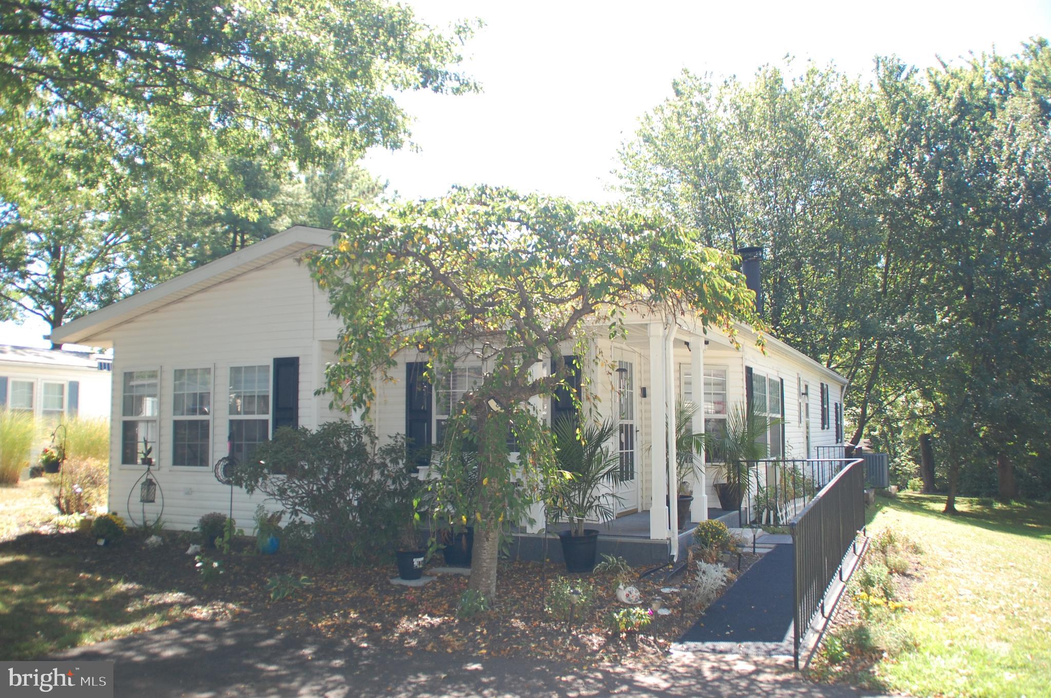 Here’s a Hidden Springs home you won’t want to miss! Professionally painted throughout, including ceilings, walls, doors and trim, using on-point colors in 2022. Beautiful, newer LVP flooring in the LR, DR, Kitchen and hallway. New roof 8/23, new air conditioning compressor (A/C outside unit) 4/22, and new water heater 7/24. You will love the cathedral ceilings and crown molding found throughout this Sun Manor home, arguably the most popular model in Hidden Springs. The Foyer with coat closet adds comfort and convenience. The overall dimensions of the Kitchen and Breakfast Room are 20’ x 13’ with lots of cabinets and counter space for the resident chef! There’s a corner cabinet in the Breakfast Room that houses speaker wires that power speakers in the LR and Primary BR ceilings. The DR offers a built-in hutch and sliding glass doors to the 16’ x 10’ deck. This home has great closet space and plus a storage shed outside. Speaking of the outside, you will enjoy relaxing on the patio nestled behind the house overlooking an expanse of grass and into wooded open space. Patio furniture included! This home is only one house away from being on the outer rim of the community and is steps away from the walking path that winds its way along a portion of the outer rim. There are lots of reasons why people love this award-winning community. Come see for yourself! Don’t miss your opportunity to own this fine home. Schedule your appointment today!