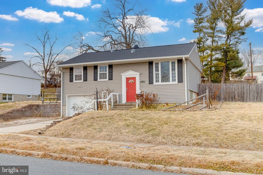 Welcome to 2020 Hanson Road, A spacious 3 bedroom, 1.5 bath split foyer home offering incredible potential and generous living space both inside and out. Step inside to the bright main level featuring an open, airy living area with hardwood flooring and a natural flow into the dining space. The kitchen offers a warm wood cabinetry, stainless steel appliances. Down the hall you will find three comfortable bedrooms, each with natural light and closet space with the full bath conveniently located on the main level. The lower level has a spacious finished rec room featuring brick wall accents and endless potential for your personal touches. The lower level also includes a half bath, access to the one car garage. Outside, enjoy a covered deck perfect for relaxing or entertaining rain or shine. The back yard is fully fenced offers privacy and storage shed.
