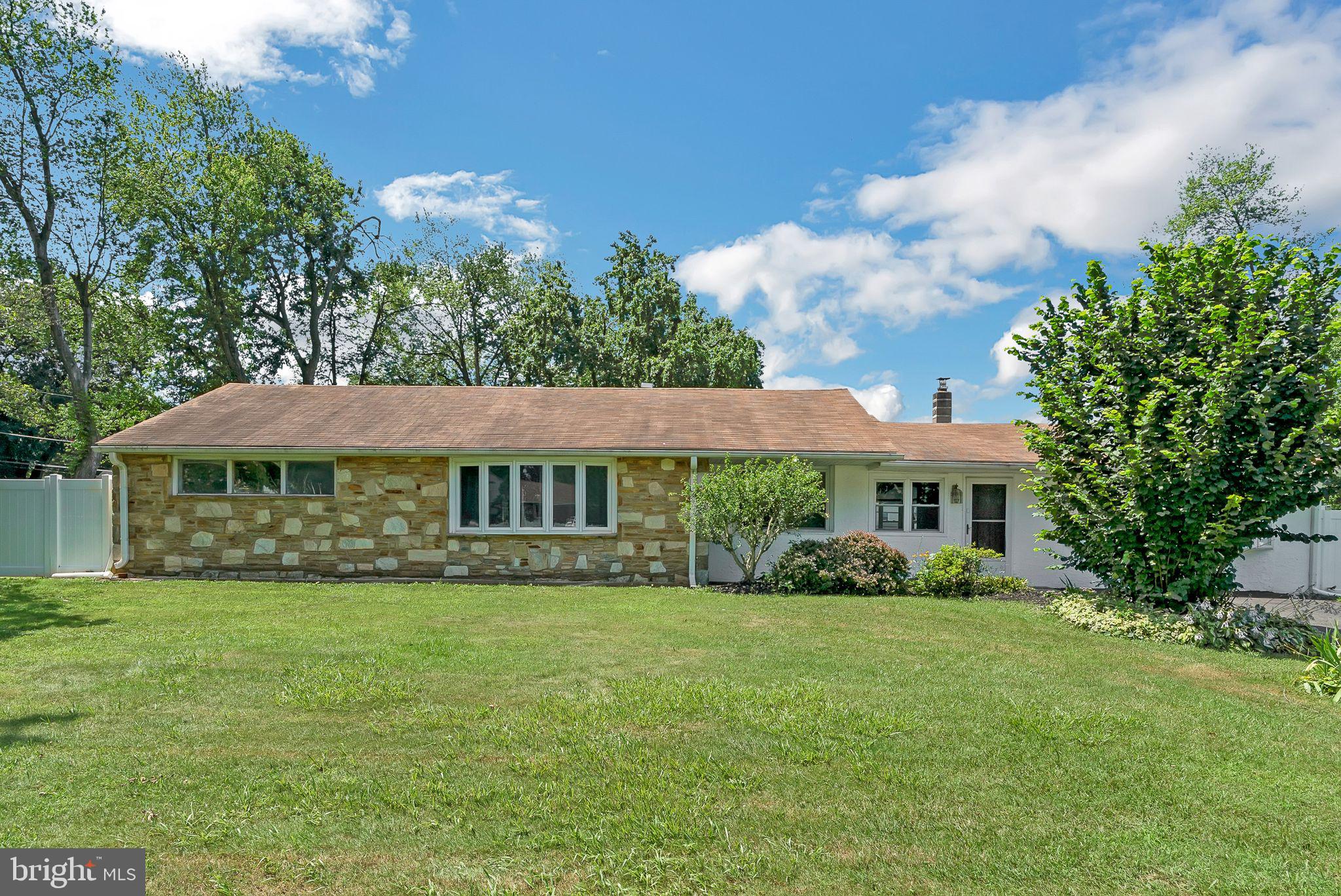 STOP THE CAR! This is an amazing opportunity to own an expanded ranch located in the highly desired Ellerside neighborhood in Bucks County. Located on a non-cut through Street and situated on a level lot with just under half an acre this home has been expanded to include four bedrooms and two bathrooms. Enter the home into a large sunny living room with pegged hardwood flooring and custom built-ins. Off of the living room, there are three bedrooms and a fully updated hall bathroom that includes custom tile, and a jetted tub. The other side of the home has a Main Bedroom with large windows for plenty of light, recessed lighting and an ultra-convenient closet and laundry area. This room could also be used as a home office, a home theater, a workout room, or a playroom. The kitchen has recessed lighting, tile flooring and backsplash, a walk-in pantry room, and a breakfast bar. The kitchen has easy access to the dining room and the finished breezeway. The finished breezeway has charming exposed brick, a convenient entrance from the driveway, access to a second full bathroom and an exit to another bonus of this property, the three-season room. This room has tiled flooring, beadboard wood ceiling, 2 ceiling fans, a sink with mounted cabinetry, real windows for comfort, heating and AC, and an exit to your amazing rear yard making this an amazing room for entertaining or just enjoying the outdoors from inside. The completely level fenced in rear yard is perfect for any ideas you have. Add a pool, possibly add a detached garage, this yard is perfect for so many things and is one of the impressive features of this beautiful lot. The private driveway on this home is double wide and will easily fit four cars. This home also boasts forced hot air heating, and AC with hot water baseboard heat as a backup. Other updates include, new AC 2023, 3 ZONE Energy Star rated Heat pump, R40 Insulated attic 2023, new vinyl fence 2024, and new sunroom roof 2025. Located on an extremely quiet street with no through access. This location is also known for convenience, as you are just minutes from major highways including I-95, Route 1, and the PA Turnpike. Close to shopping, dining, entertainment, and activities at the nearby Delaware River. Rated this as one of best school districts for 2025. Bensalem also has a nationally accredited Police Department! This home is worth a look for the lot alone. Come take a tour of this home today!!
