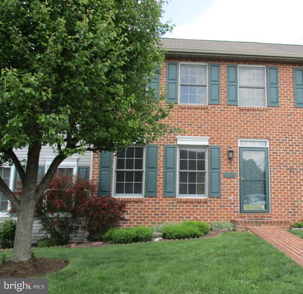 Tastefully updated town home with backyard view of woods from deck or patio below. Brand new laminate floors, newer carpets, new stove, newer dishwasher, new slider to deck and toilets are new. All new paint and finished LL with a laundry room.