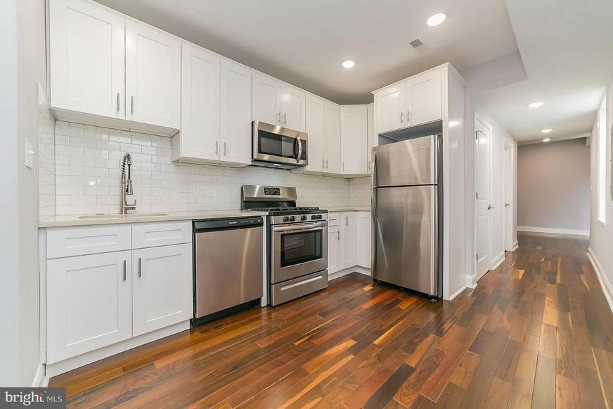 Newer construction, first-floor bi-level 3BD/3BA on 26th, and Cecil B Moore Ave is available now! Enter unit 1, and you'll see the first bedroom and first bathroom. The open kitchen features stainless steel appliances! Central A/C and heat! Keyless entry in the building. Each bedroom has its own bathroom! The second bedroom has an en-suite bathroom. There is a private backyard just for unit 1. The lower level houses a huge den perfect for entertaining, the third bedroom, and laundry in the rear. A video walkthrough is available. Tenants pay gas, electric, water, cable/wifi. First, last, and security to move in.