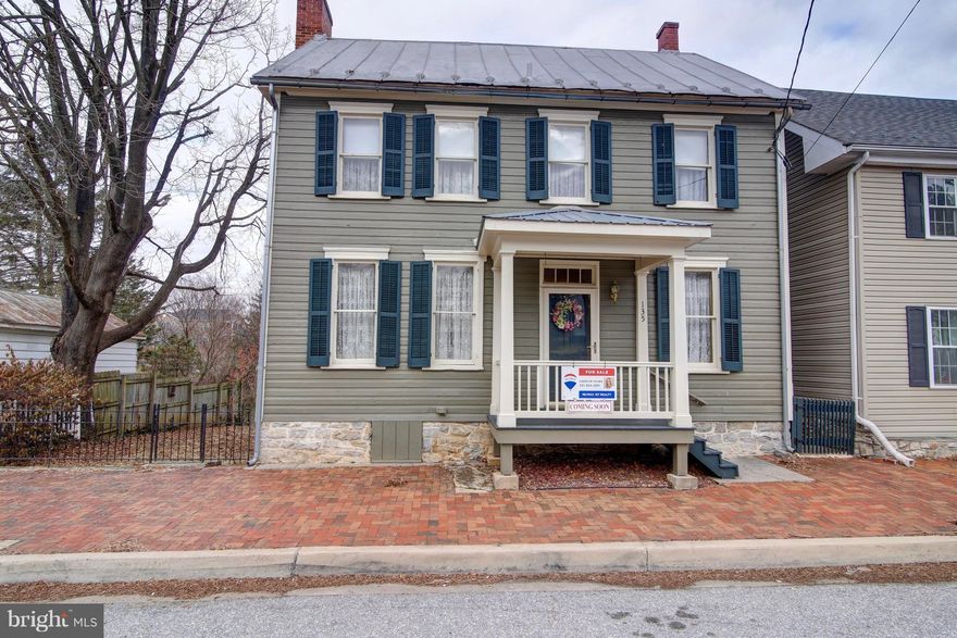 Beautifully renovated Civil War Era home in downtown Sharpsburg. Gleaming HW throughout w/beautiful trim finishes! Den/Office w/exposed log walls & beams, LR w/fireplace. Formal DR, large kitchen with breakfast nook and stairs leading to upper level. Master suite w/full bath, 3 addt'l large BR. Laundry on upper level. Attic & basement ready to be finished! Expansive rear yard, 2 covered porches.