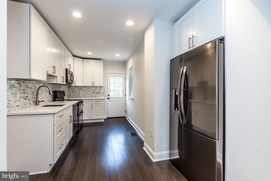 4 bedroom home in hot fishtown area of city. Everything was totally redone and is basically new construction .Kitchen has White shaker cabinets with white quartz countertops and has top of the line LG appliances with double oven range. House has has brand new wiring and recessed lights throughout. 2 beautiful full baths that are fully tiled. House has hardwood floors throughout. Basement is semi finished and has new heating/air conditioning  with brand new ductwork. Front of house was professional stucco work and the back has brand new siding. Come take a look at this beautiful home.