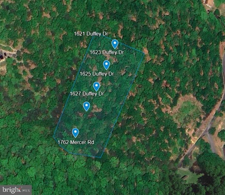 RARE opportunity to purchase 5 lots all in a row totaling for over 2.5 acres! Limited access to the property Seller will not sell individual lots, must purchase all 5 lots as one package deal. No Soil Study or Testing has been conducted. Land Package Includes 5 Lots Total: 1762 Mercer Rd (7201-29-1467), 1627 Duffey Dr (7201-29-1977), 1625 Duffey Dr (7201-29-2386), 1623 Duffey Dr (7201-29-2796) , and 1621 Duffey Dr ( 7202-20-2907)