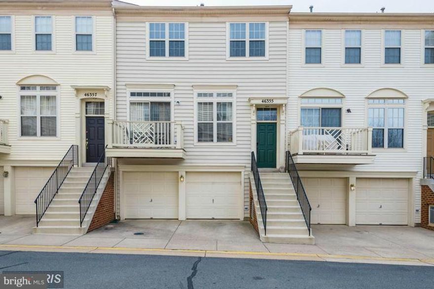 Beautiful 2 BR/2 BA home with 2 car garage*Hardwood floors, upgraded lighting & custom paint on main level*Upgraded kitchen w/granite & maple cabinetry*Upper level features 2 bedrooms & 2 full baths including Master Bedroom w/cathedral ceiling, 2 closets and cooling ceiling fan*MBA with double sink vanity*Lower level features separate laundry room*Sunny open floor plan, small balcony & more!