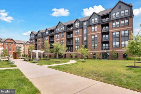 Photo of 3927 Fair Ridge Drive #307, FAIRFAX, VA 22033 (MLS # VAFX2330870)
