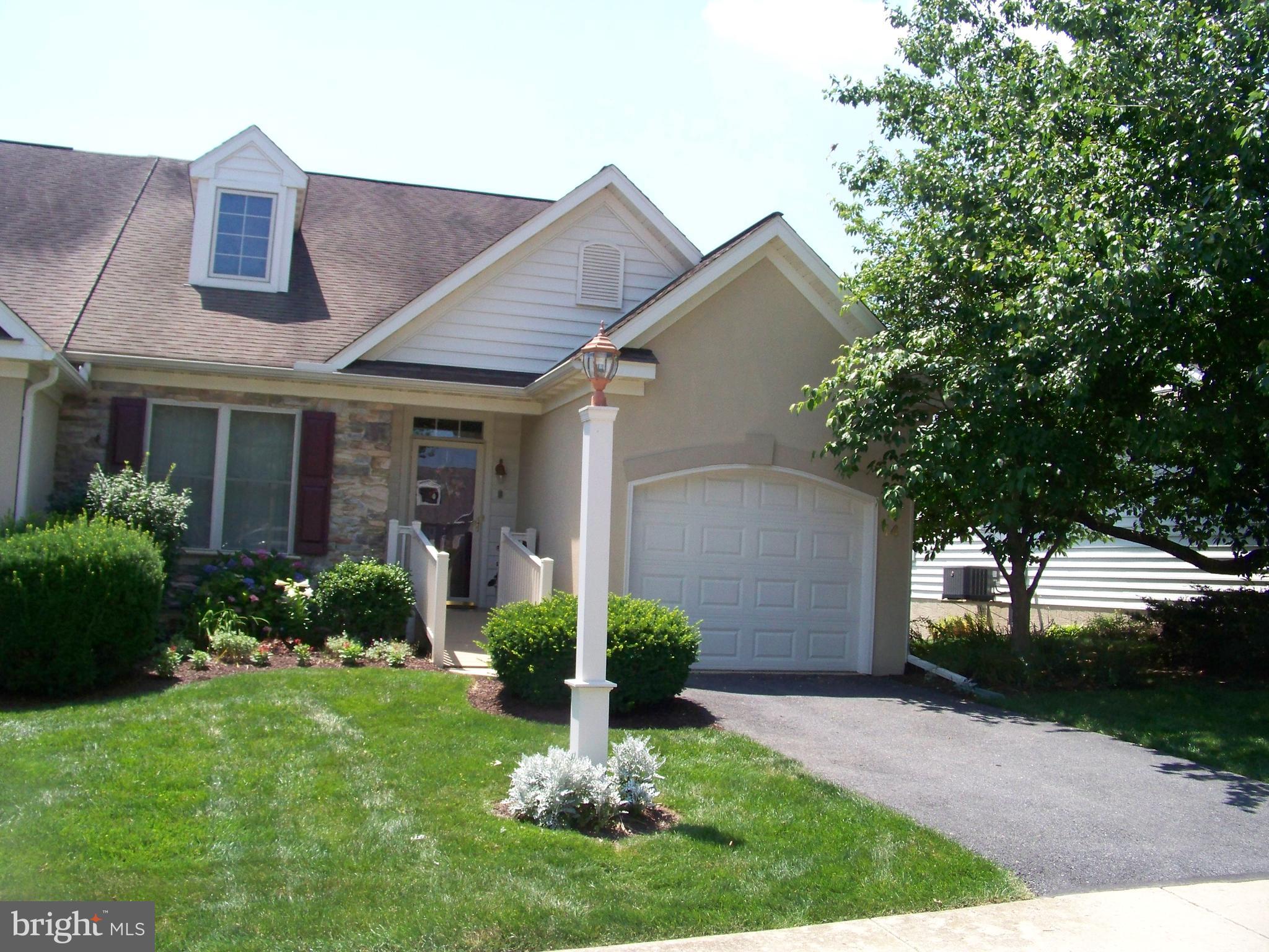 Charming two-bedroom condominium in very prestige Crossing at Rocky Springs In Lampeter Strasburg Schools. This well-kept home features main floor living offering two bedrooms ( primary with full bath/ double vanity & walk-in closet ), open concept with kitchen, dining area and living room w/ natural gas fireplace. Hardwood flooring throughout except kitchen. Attached one-car garage. Full unfinished basement with outside entrance to patio. Enjoy your days on the rear deck overlooking the tennis/ pickle ball courts. Lovely landscaping. Public water & sewer. Such a nice neighborhood ready for you to come aboard.