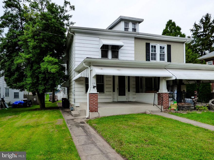 Semi-detached home located immediately across from the Mt. Wolf public park!  Walk across the street to the tennis courts, the basketball court and swigs and slides!  This home has a full front porch, 3 bedrooms, 1 1/2 baths, a 1st floor laundry room, a self cleaning gas stove, a refrigerator, hardwood floors, ceiling fans and lights in every bedroom, storage in the floored attic and tons of storage in the full unfinished basement.  This home has a modern forced hot air gas furnace, a 40 gallon gas water heater and an updated full bath.  This property would be FANTASTIC for a family looking to flip their own home as they could have tons of equity if done right - the location is perfect for it!  Hurry before someone else  gets the potential  before you miss out!