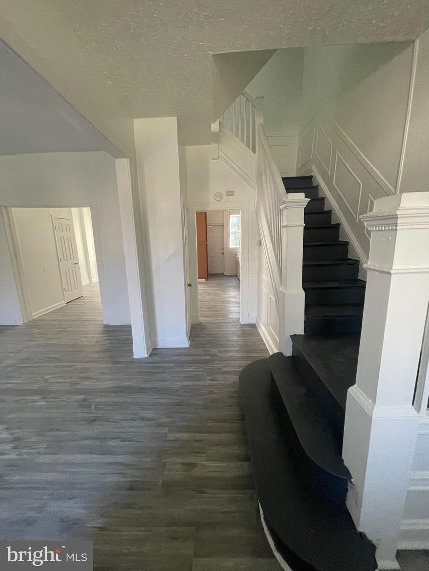 Looking for room to spread out? Look no further than this bright and spacious three-story house. It's got 4 bedrooms and 2.5 bathrooms plus bonus space in the basement and attic. The kitchen is equipped with gas oven/range, microwave, refrigerator, and freezer. This home also features front and back porches for relaxation and entertaining. Available for lease starting November 1, 2025 with option to move in earlier if desired.  Tenant must have 700 credit score. First month's rent and security deposits required. Security deposit includes $200 towards the first month's water bill.