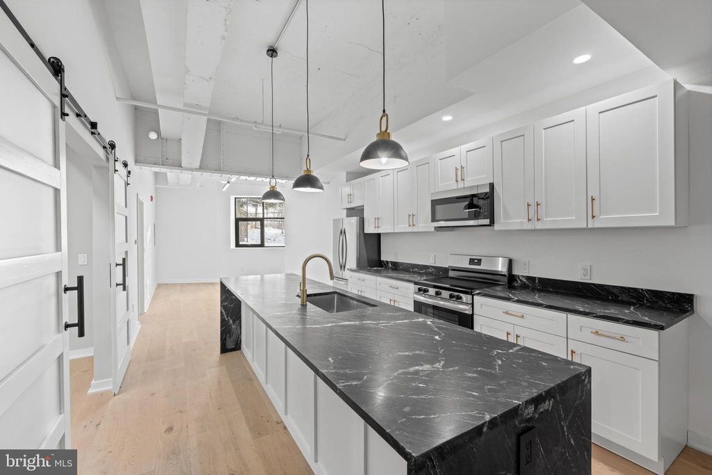 Photo of 36 N Narberth Avenue #1B, NARBERTH, PA 19072 (MLS # PAMC2164636)