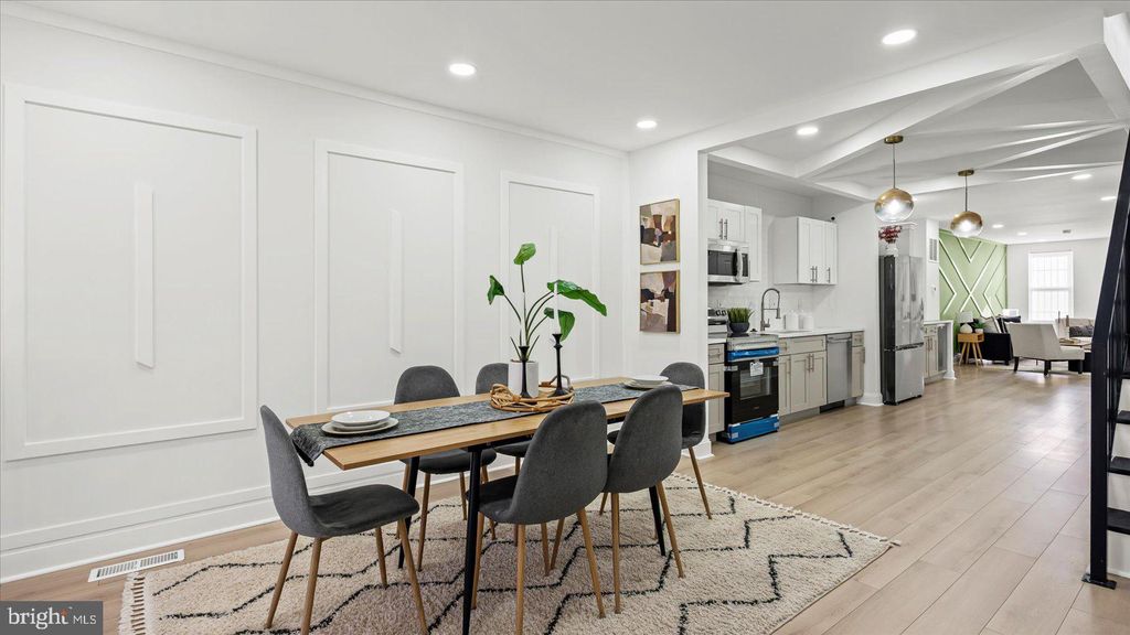 Photo of 725 E 20th Street, BALTIMORE, MD 21218 (MLS # MDBA2192068)