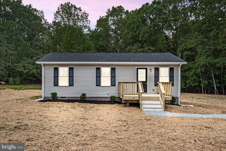 Welcome to 17009 Douglas Rd in Barboursville—a charming, fully renovated 3-bedroom, 1-bath ranch-style home offering one-level living on just under 2 acres. Originally built in 1990, the home was completely updated from top to bottom in 2025 and features a bright, open floor plan with modern, low-maintenance finishes throughout.
The interior includes fresh paint, brand new carpet in the bedrooms, and new LVP and LVT flooring in the living areas, kitchen and bathroom. The kitchen has been completely redone with all-new cabinets, quartz countertops, and stainless steel appliances, opening seamlessly to the main living space. All windows were replaced in 2025, and the home includes new plumbing and electrical fixtures throughout.
Additional 2025 improvements include a new roof, new HVAC system, new hot water tank, new gutters, and two brand new decks—perfect for enjoying the outdoors. The septic system has been professionally inspected and updated with a new distribution box and header lines. The home is served by a private well. The freshly painted exterior is complemented by new landscaping and a beautiful, private backyard—ideal for relaxing or entertaining.
Simple, clean, and move-in ready—this thoughtfully updated home offers peaceful rural living with modern comfort. Schedule your showing today so you don't miss out!