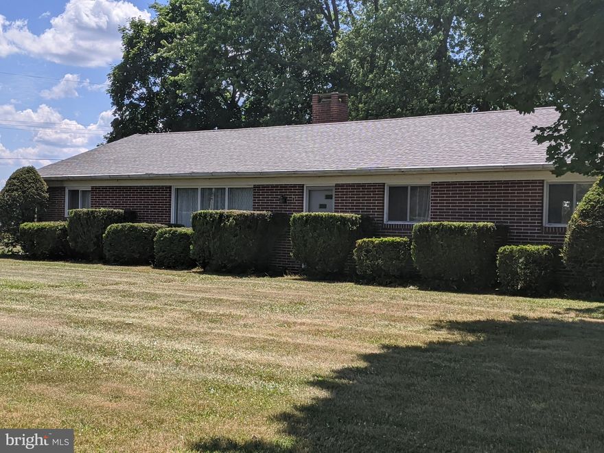 Country Brick Ranch home with attached 2 car garage.  This home features two bedrooms, galley style kitchen, dining area, living room with fireplace, full bath and laundry room situated on a large lot! This is a small home, owner wants one or two occupants only. OWNER HAS A NO PET POLICY.