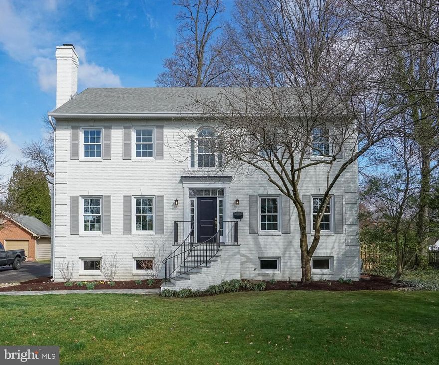 Totally renovated, spacious and open Falls Church City colonial home, with stunning upgrades throughout.  Featuring over $300,000 in recent updates including Brand new kitchen with white shaker cabinets, Virginia Mist granite slab in kitchen with top of the line Jenn Air appliance suite, luxe primary bathroom suite and designer level bathrooms, mudroom and office spaces.  Solid core interior doors throughout, solid oak hardwoods throughout main and upper levels, new windows, new wood deck, new flagstone walkway, freshly painted and new light fixtures throughout and all new luxury vinyl tiles in the lower level.  Spacious double car garage (new garage doors) for extra storage and private, fenced backyard for Fido.  All on a large, nearly one third acre lot, sited on a quiet cul de sac.  Just two block walk to Lincoln Park, three blocks to W&OD Trail and four blocks to Cherry Hill Park.  Just 1/2 mile+ walk to downtown Falls Church restaurants, groceries, shopping and much more.