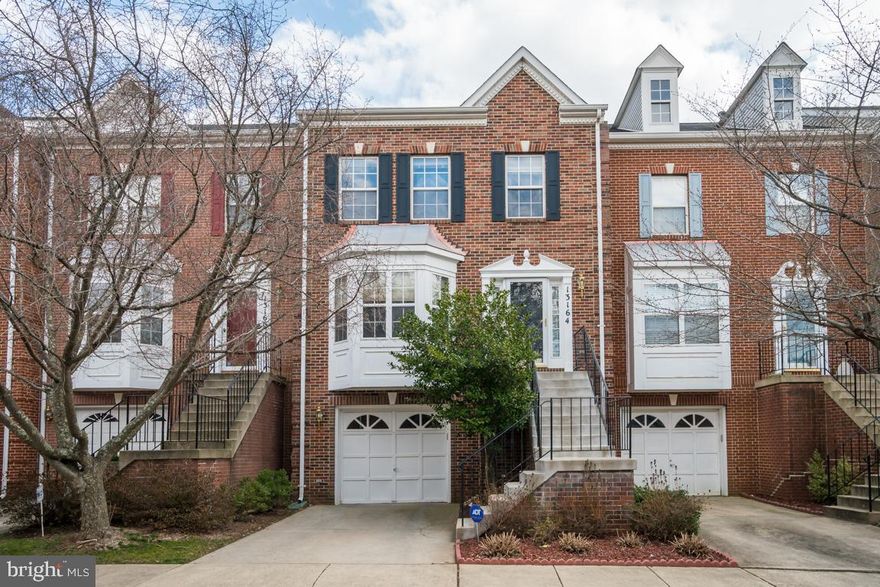 Open House: Saturday (03/23) from 1:00PM-3:00PM. Private community within McNair Farms master plan. Pool/club house, tennis/basketball courts, walking paths. Open floor plan with entrance into living/dining room, large kitchen/dining area and deck open to natural wooded area. Walk out family room in lower level with covered patio. Three bedrooms up stairs and two full baths. Great location minutes from Metro bus and rail.