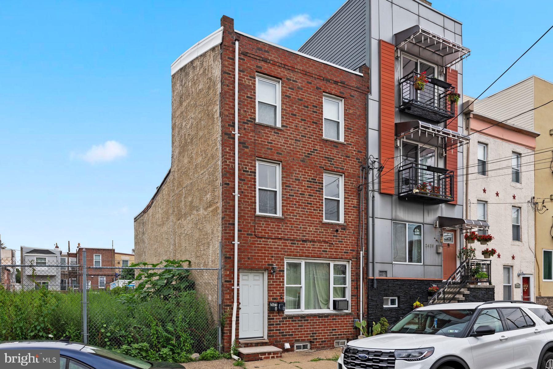 A great opportunity including parking awaits in Fishtown! This duplex has an owner occupied bilevel upstairs unit with 2 beds and 1 bath. The kitchen is updated and efficient. The upstairs unit has air conditioning and in house washer and dryer. There's a balcony off the kitchen that is a good spot for a grill or a few chairs to watch the world go by. Downstairs is a tenant occupied 1 bed, 1 bath unit. The tenant has laundry for use in the basement. A true gem with rental potential, or live upstairs and rent the lower level. With parking large enough for 3 cars, it cannot be beat! This is a prime location, convenient to all that Fishtown has to offer and minutes from public transportation and I95.