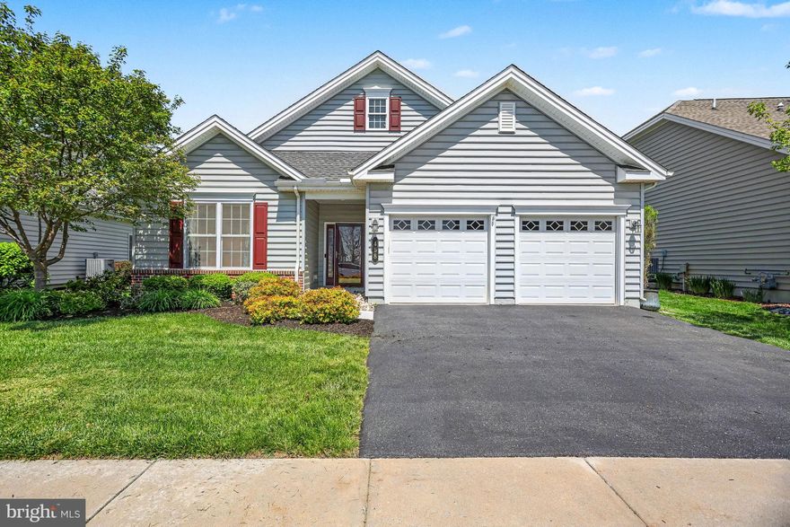 Welcome to 468 Resolution Drive, located in the highly sought-after Traditions of America at Lititz—an active 55+ community known for its low-maintenance lifestyle and top-tier amenities. This thoughtfully updated single-floor home offers 2 bedrooms, a private office, and 2 full bathrooms, all designed for easy, comfortable living—including accessibility modifications for added convenience. Step inside to an open-concept layout filled with natural light and elevated finishes throughout, including updated engineered hickory hardwood flooring that runs throughout the home. The main living area flows effortlessly into the kitchen and dining space, creating the perfect setup for both everyday living and entertaining. The kitchen has been extensively updated with upgraded appliances, soft-close cabinetry, under-cabinet lighting, and thoughtful design enhancements that add both function and style. The dedicated office features custom built-ins, providing a functional and stylish work-from-home space. The spacious primary suite is privately situated at the rear of the home, offering a quiet retreat with a well-appointed en-suite bath featuring a roll-in shower for ease of access. Additional custom closet systems and upgraded lighting further enhance the home’s livability. The 2 car garage features plenty of parking space and also offers private stair access to a heated and cooled upper-level storage/utility room, providing approximately 520 sq ft of additional finished space—perfect for storage, hobbies, or organizing all your extras. Enjoy outdoor living on the expanded patio, complete with a retractable awning and upgraded exterior finishes—ideal for relaxing or entertaining in comfort. Additional upgrades include a tankless water heater, whole-house water softener, air scrubber, and security system—offering peace of mind and efficiency. All of this in a prime Lititz location just minutes from downtown, local shops, restaurants, and major routes—while still enjoying the ease and convenience of community living. Don’t miss your opportunity to own in one of Lititz’s most desirable 55+ communities!