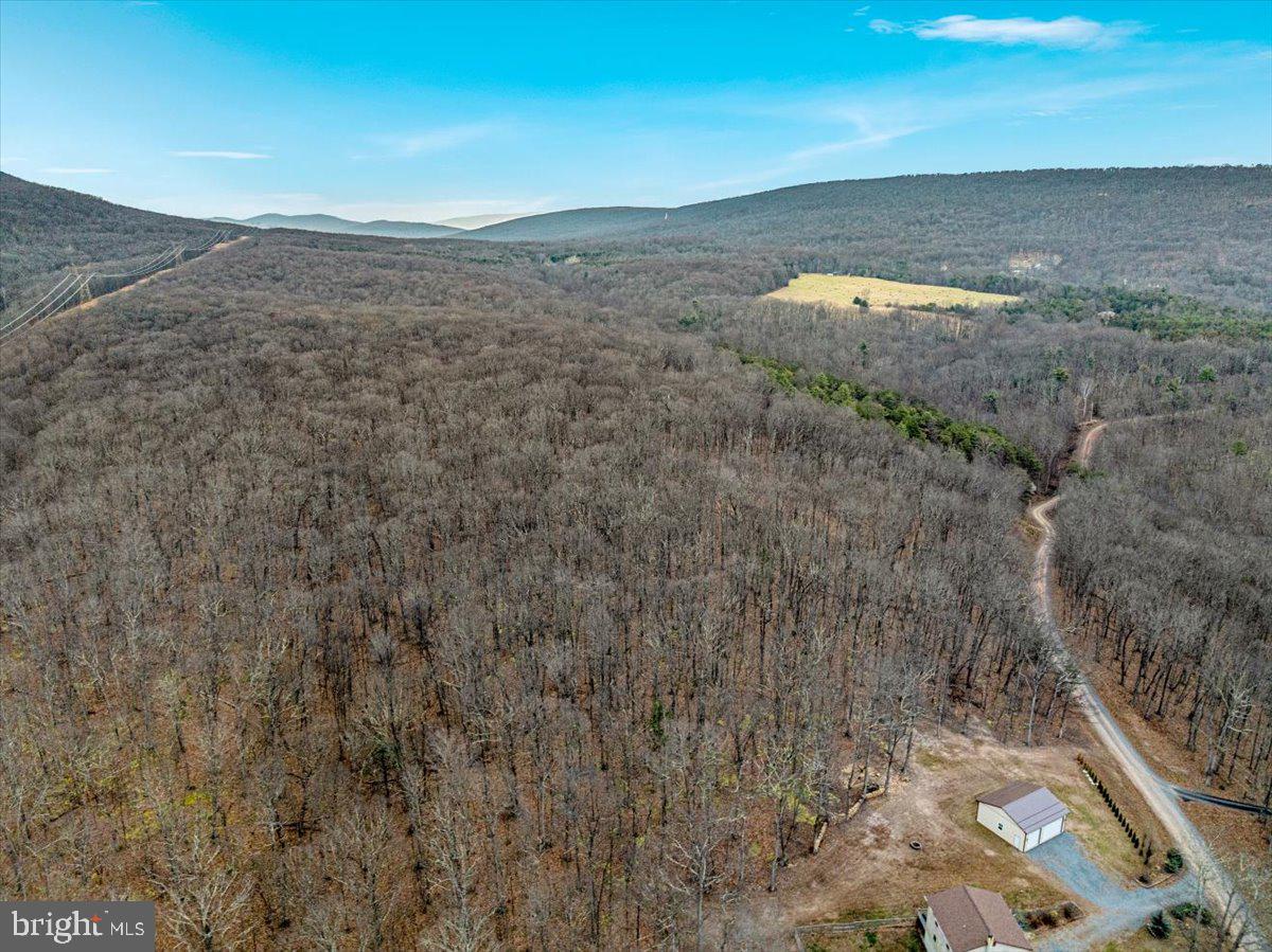 WHISPERING PINES - Land