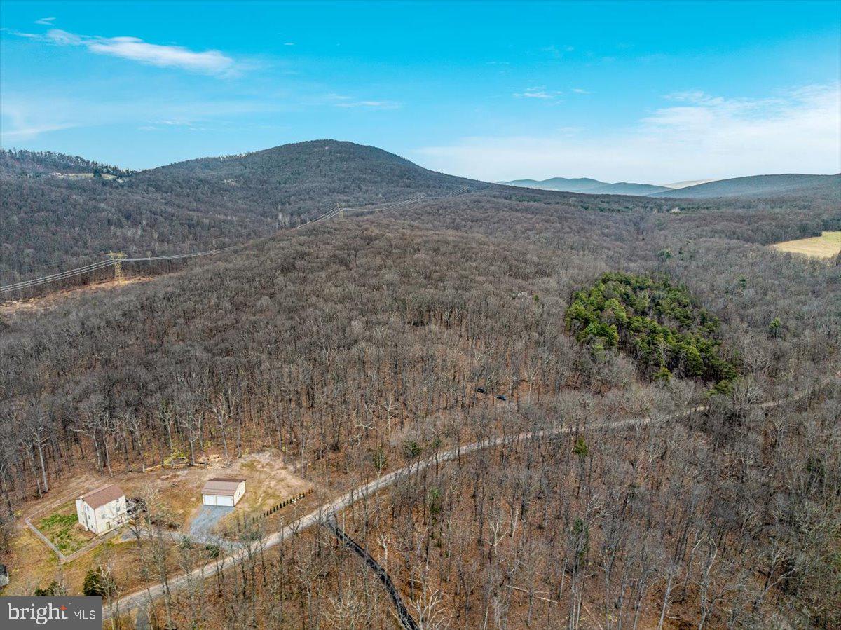 WHISPERING PINES - Land