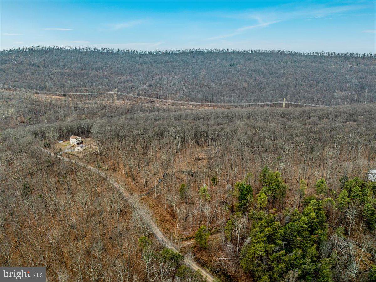 WHISPERING PINES - Land