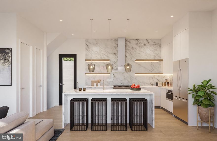 Welcome to this exquisite residence nestled on a tranquil street in the heart of Washington Square West. This distinguished home offers a perfect blend of sophistication and comfort, boasting 4 bedrooms and 4.5 bathrooms across its expansive floor plan. From the moment you approach, the handsome brick facade sets the tone for the amazing home awaiting you inside. Step through the front door, and you'll be greeted by a seamless fusion of modern luxury and timeless charm. The attention to detail is evident in every corner, with top-of-the-line finishes enhancing the overall ambiance. The open-concept layout seamlessly connects the living, dining, and kitchen areas, creating an ideal space for entertaining guests or simply enjoying day-to-day living. The well-appointed kitchen is a chef's dream, equipped with top of the line appliances and a stylish aesthetic. The primary suite is a true private oasis, providing a serene retreat with a spa-like full bathroom. Imagine unwinding in the tranquility of your own space, surrounded by tasteful design elements and thoughtful amenities. The remaining three graciously sized bedrooms are equally inviting, offering ample space for relaxation. Each bathroom in the residence is a testament to refined taste, featuring upscale fixtures and a commitment to quality. Beyond the interior, the property's location on a quiet street is one you'll love while still being in close proximity to the vibrant energy of Washington Square West. Whether you're strolling through the neighborhood's charming streets or enjoying the nearby cultural attractions, this residence provides a perfect balance of serenity and urban living. This stunning home offers a rare opportunity to experience the best of both worlds – a tranquil haven within the lively and sought-after Washington Square West neighborhood. Taxes and square footage are the responsibility of the buyer to have verified. Renderings and photos are for marketing purposes only and may not portray actual finishes.