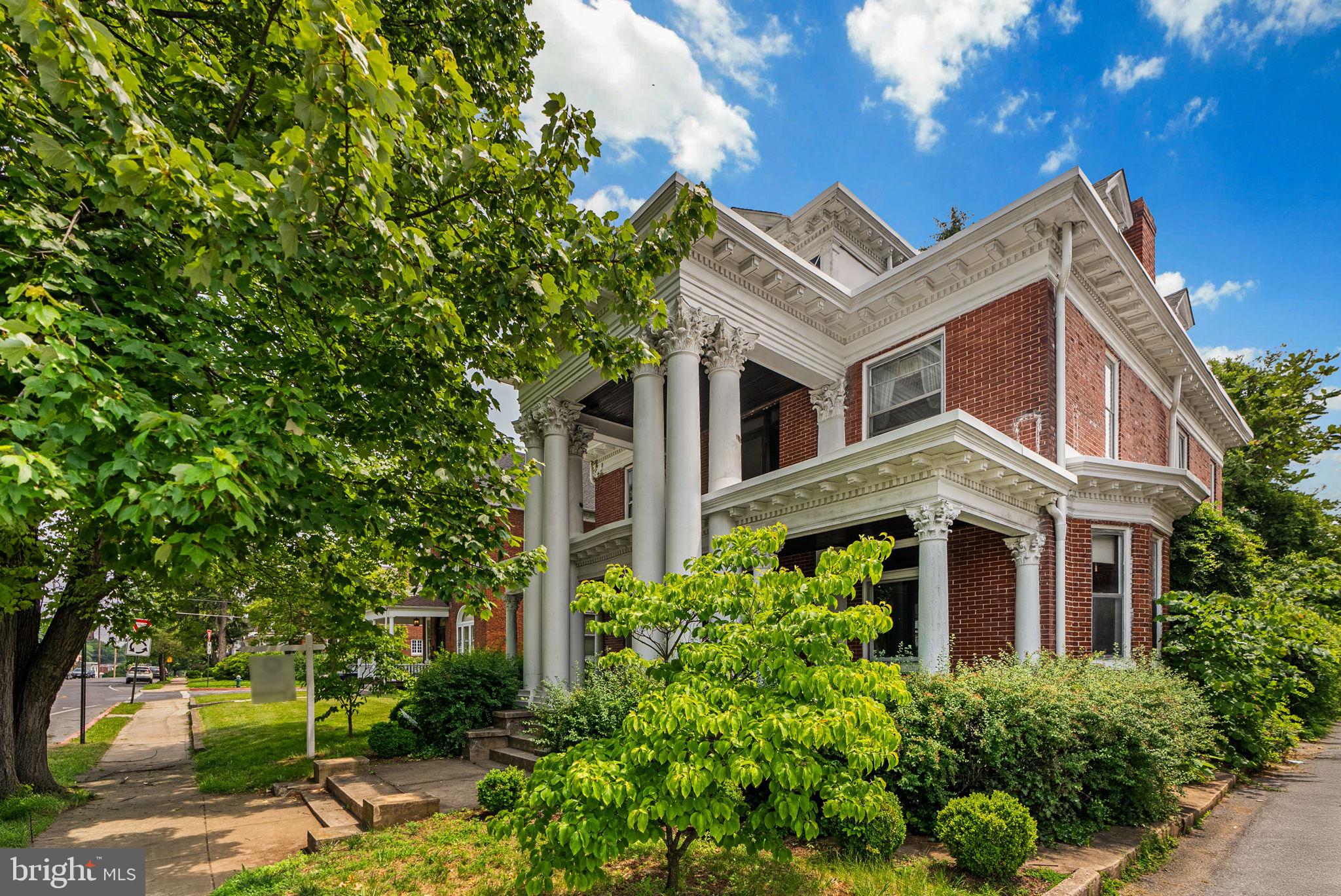 ***OPEN HOUSE SUNDAY 6/22 - 11:00-2:00***
Over 5,000 Sq Ft of Charm & Potential in the Heart of Hagerstown!
This stunning property boasts over 5,000 square feet and some of the best curb appeal in all of Hagerstown. The magnificent architectural columns at the front entry make you feel like royalty the moment you arrive.
Step inside to a spacious dining and living area, where you're immediately greeted by the warm elegance of chestnut hardwood floors and original trim, along with antique chandeliers that add a timeless charm to the main level. A beautifully tiled fireplace anchors the space—one of three fireplaces on the main floor(now sealed). The flex space off the family room on this level could also be used as a 6th bedroom!
The previous owner was an artist with a keen eye for detail, and it shows throughout, especially in the kitchen’s unique, hand-crafted tile work. From the kitchen, a side door leads you to your side porch and own backyard oasis.
Downstairs, you’ll find a large unfinished basement with space for laundry, utilities, storage, and more. The possibilities here are endless—perfect for storage, a workshop, or additional living space. Basement floor plan photo not included, over 1,600 extra sqft of unfinished space!
Upstairs features all 5 bedrooms, each with continued chestnut floors and trim, and some with original (sealed) fireplaces, including a spacious and elegant primary suite. There are multiple balconies—one overlooking the front of the home, framed by those iconic columns, and another wrapping around the rear of the house. Please use caution when accessing the balconies and proceed at your own risk.
Don’t forget the attic! This bonus space offers additional unfinished square footage with potential for additional bedrooms or living space, plus plenty of room for storage!
While the home does need some updating, it has solid bones and several key improvements—including a brand-new roof installed in 2024.
MOTIVATED SELLER! BRING HIGHEST AND BEST OFFERS!