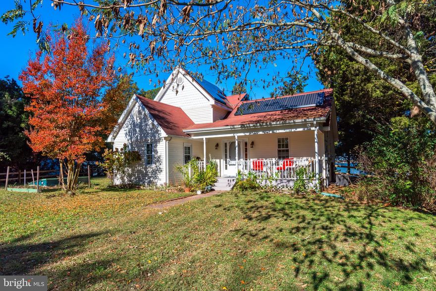 Welcome to "The Anchorage" — a charming waterfront retreat overlooking the Wicomico River.
This historic 1870 home features two modern additions. Nestled on an elevated lot with a sandy beach, the property offers stunning panoramic river views from the living room and sunroom.
The main level features a spacious living room with a gas fireplace shared with the dining area, a well-equipped kitchen, and a first-floor bedroom and full bath. Upstairs, you’ll find two additional bedrooms, a full bath, and convenient attic storage.
Enjoy comfort year-round with gas heat, central air, and an additional mini-split system on the second floor. Other highlights include leased Tesla solar panels and new sunroom roof.
Outdoor living is equally inviting, with mature landscaping that includes a striking Mimosa tree, red Crape Myrtle, and white Crape Myrtle. Additional outdoor features are the fenced yard and outdoor shower.
Experience Eastern Shore living at its best in this one-of-a-kind waterfront home. Just moments away from Mt. Vernon Harbor. One hour drive to Ocean City Maryland or either Assateague beaches.