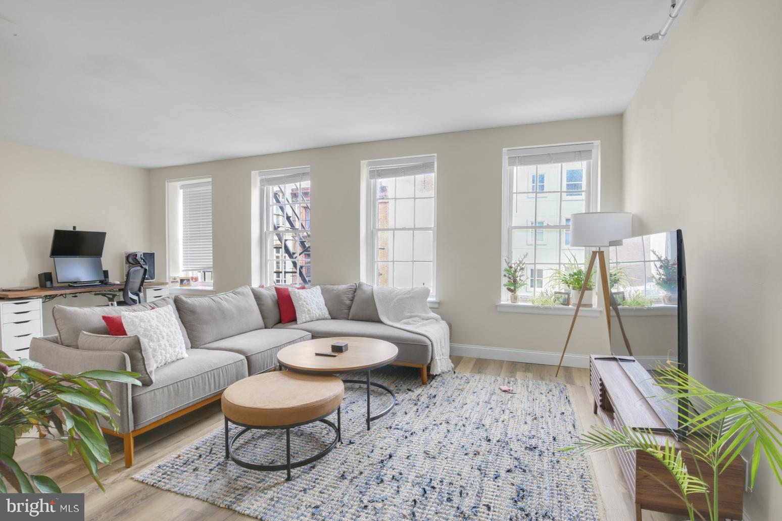 Available Early May:
Welcome to 44 S 3rd St #4F! This stunning 1-bedroom 1-bathroom apartment is a fourth-floor walk-up with a bright open layout. Step into the common area where large windows line one wall filling the space with natural light. The modern kitchen sits toward the back and features gray shaker cabinets, tile backsplash, white quartz countertops, stainless steel appliances, and counter seating with accent lighting. A sleek spiral staircase leads upstairs to a hallway connecting the full bathroom and bedroom. The bathroom offers tile flooring a lighted vanity with extra storage and a marble-tiled shower/tub combo. The spacious bedroom has big windows and a skylight creating a bright and airy feel. Central A/C ensures year-round comfort. Schedule your tour today and get ready to fall in love with this incredible rental unit!
Lease Terms:
Generally, 1st month, 12th month, and 1 month security deposit due at, or prior to, lease signing. Other terms may be required by Landlord. $55 application fee per applicant. Pets are conditional on owner's approval and may require an additional fee, if accepted. (Generally, $500/dog and $250/cat). Tenants responsible for: electricity, gas, cable/internet, and a $35/month flat water fee. Landlord Requirements: Applicants to make 3x the monthly rent in verifiable net income, credit history to be considered (i.e. no active collections), no evictions within the past 4 years, and must have a verifiable rental history with on-time rental payments. Exceptions to this criteria may exist under the law and will be considered.