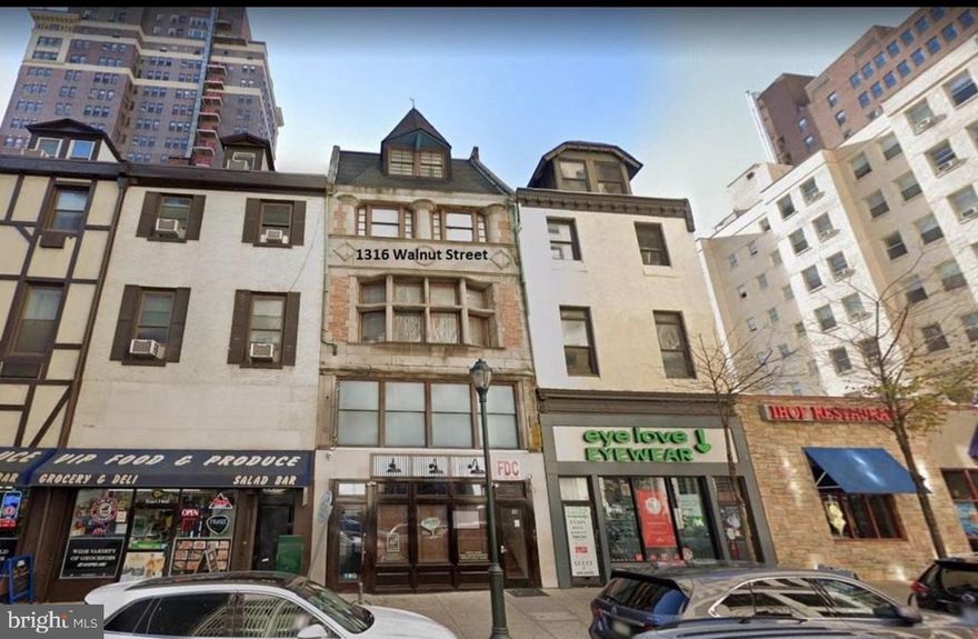 Opportunity  is knocking! This property is situated in a highly desirable, high foot traffic area - Center City. The building spans from street to street and features one commercial space along with nine residential units, offering excellent investment potential. The commercial space is approximately 3,820 sq ft, consists the first floor and mezzanine, has approximately 7 years remaining lease term with two 5yr options. With the 9 apartments, which consists of 8 two-bedroom units and 1 one-bedroom unit. Not to mention 4 of the units are bi-level. Currently, 7 of the 9 apartments are leased to tenants who operate Airbnb businesses. Liquor license (R) is also available to sell for additional $200,000. Schedule your showing today!!!