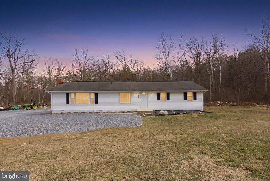 Welcome to 5002 E Point Rd, Your Fully-Renovated Creekside Retreat!

This home is hardwired with new (2025) 360° Pro ring system home security featuring 7 top of the line 4K cameras with 14 motion sensing lights and bird’s eye view and all controlled by your phone from anywhere for absolute peace of mind.

This beautiful, fully-renovated 3-bedroom, 2-bathroom, 1,536 sq ft residence is situated on 0.7 acres of peaceful, secluded land. The property offers a storybook-like setting with a creek running through the backyard year-round. The Shenandoah River is less than  4 miles away with public boat and kayak launches. —perfect for kayaking and fishing—

Conveniently located only 16 miles from JMU. Only 11 miles from Shenandoah National Park, this home is ideal for anyone looking for an easy commute to Harrisonburg or a lifestyle near the mountains. Massanutten is a 12min drive to the top. Hiking trails as close as 1 mile away in the National Forrest. Hundreds of hiking trails all around featuringwaterfalls and amazing views! With several excellent restaurants within a 10-minute radius and grocery store a few Minutes down the road. This location offers incredible centralization. 

Dump is free to residents!

The home has been meticulously updated from the inside out to provide total peace of mind. Major structural and mechanical upgrades include 30 yr roof (2020), a new electrical system and panel (2020), a new hot water heater(2022), new LVP Flooring (2025), new stainless steel appliances (2025), and a well pump and septic pump both replaced in (2023). New LG washer/dryer (2025). 

For enhanced comfort and efficiency, the attic and crawl space have been fully insulated, and the entire home has been treated with a mold preventative with a transferable 3 year warranty. Outside, you will find a newly installed stone driveway with 3 car parking in front, 6 car parking in rear, and room for many more. featuring a custom rock design entry and drainage, along with a brand-new fire pit perfect for evening gatherings.

Inside, the home shines with a freshly painted interior and new LVP flooring throughout. The kitchen is a chef's delight, equipped with a full suite of new stainless steel appliances including a stove, dishwasher, refrigerator with ice maker, and a microwave. The spacious master bedroom provides a private retreat, while the two full baths feature full tub-showers. Additional conveniences include new laundry appliances (washer and dryer), a water treatment system, a garbage disposal.

This home comes with an efficient oil furnace and central air. The largest room has a beautiful wood stove surrounded by brick to a brick chimney. Electric fireplace for extra ambience.