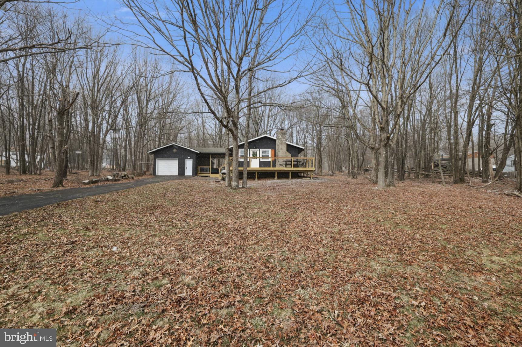 Amazing LAKEVIEW home in a gated STR friendly community! You won’t be disappointed at this newly renovated lake front cottage located in the private, amenity filled Indian mountain lakes community! The home is on an acre of land and features a hot tub and outdoor seating area w/ outdoor TV, front deck with spectacular lake views, backyard fire pit, gas grill, game room with rock climbing wall and monkey bars, fully renovated kitchen, open concept living/dining room with new propane fireplace and so much more! The community features 5 lakes, 2 swimming pools, tennis courts, walking trail and so much more! *Please note counters were recently updated to granite as shown in some of the photos, they are no longer butcher block* Being sold turn key, fully furnished with bookings!!