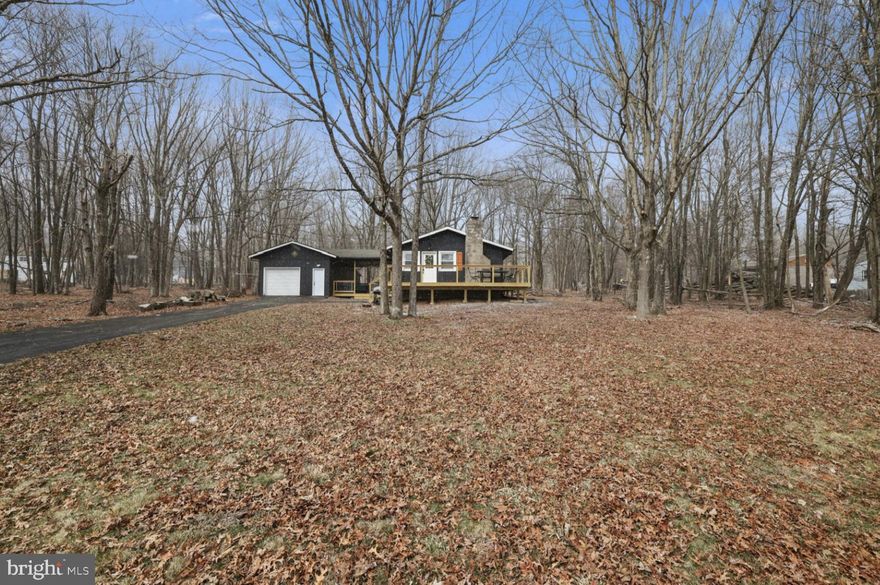 Amazing LAKEVIEW home in a gated STR friendly community! You won’t be disappointed at this newly renovated lake front cottage located in the private, amenity filled Indian mountain lakes community! The home is on an acre of land and features a hot tub and outdoor seating area w/ outdoor TV, front deck with spectacular lake views, backyard fire pit, gas grill, game room with rock climbing wall and monkey bars, fully renovated kitchen, open concept living/dining room with new propane fireplace and so much more! The community features 5 lakes, 2 swimming pools, tennis courts, walking trail and so much more! *Please note counters were recently updated to granite as shown in some of the photos, they are no longer butcher block* Being sold turn key, fully furnished with bookings!!