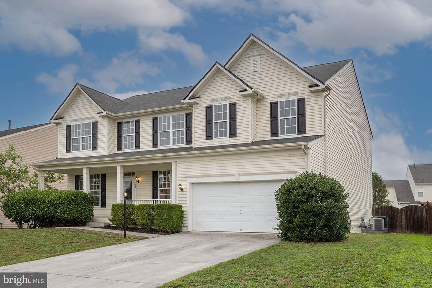 Welcome to this  spacious approx. 3440 finished square ft home featuring 4 spacious bedrooms and 2.5 baths and a loft area.
The main level boasts hardwood floors throughout, creating a warm and inviting atmosphere. The upper level includes a versatile loft area, perfect for a home office, playroom, or additional living space. Enjoy outdoor living with a rear fenced yard, a patio for entertaining, and a covered front porch perfect for relaxing. The attached garage provides convenience and additional storage. This home combines classic colonial charm with modern amenities for comfortable living.
 Don't miss the opportunity to make this your new home! Roof approx. 2022, furnace upper level approx. 2021, new HVAC on upper level.