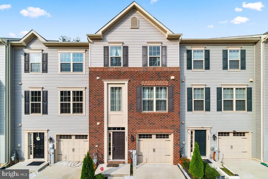Stunning three-level townhome! This home makes a fantastic first impression with its beautiful brick-front design and beautifully landscaped front yard. Inside, you will be welcomed by a grand rec room with a walk-out that leads to the patio with wooded views. The main living level of the home has a bright and airy ambiance and features an open floor plan with hardwood floors all throughout the main level, living, dining, gourmet kitchen, and family room. The gourmet kitchen is open to the dining, living, and family room and features beautiful granite countertops including a kitchen island with seating, modern white cabinetry, high-end stainless-steel appliances, modern tile backsplash, and pendant lighting. The upper level features the laundry area, 3 bedrooms including the stunning master suite which features a sitting area that overlooks the wooded views, a large walk-in closet, and an adjoining bathroom with dual granite vanities, and a beautifully tiled walk-in shower. Located close to Arundel Mills/Ft, easy access to rt 100, rt 295, a drive away to Annapolis and Baltimore. This home is sure to be at the top of your list! Call us today to schedule your private tour!
