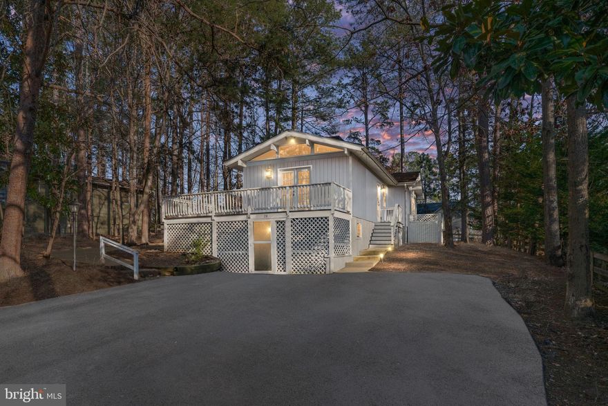 Welcome home to this charming ranch with a fully finished walkout basement, set in the sought-after Lake Monticello community — where everyday living comes with a vacation vibe.

Step inside to soaring vaulted cathedral ceilings accented with warm natural wood, creating an inviting, lodge-style feel throughout the main level. The large living room features a beautiful brick fireplace, perfect for cozy evenings, while the bright eat-in kitchen offers plenty of space for gatherings.


The main level boasts brand-new luxury vinyl plank flooring throughout, fresh paint, and new carpet — move-in ready from day one. The spacious primary bedroom is conveniently located on the first floor and includes its own private en-suite.

Downstairs, the fully finished walkout basement offers incredible versatility — complete with a second brick fireplace, large open living area, half bath, and access to the backyard. Ideal for guests, entertainment, hobbies, or movie nights.

Outside, enjoy gorgeous wood cathedral-style details over the massive wraparound deck overlooking a generous yard — perfect for outdoor dining, relaxing, or hosting friends.



Major updates provide peace of mind:

• Roof is under1 year old -has a 50 year transferable warranty. 

• Water heater (2023)

• HVAC approx. 4 years old

• Brand-new dishwasher & microwave

• Newer stove and refrigerator

• Newly paved driveway



And then — there’s the lifestyle. Situated in Lake Monticello, you’ll have access to a private 352-acre recreational lake with beaches, boating, kayaking, fishing, and gorgeous views. Residents enjoy 24-hour gated security, a clubhouse, community pool, tennis and pickleball courts, playgrounds, picnic areas, and multiple sandy beaches — all just a short distance away.