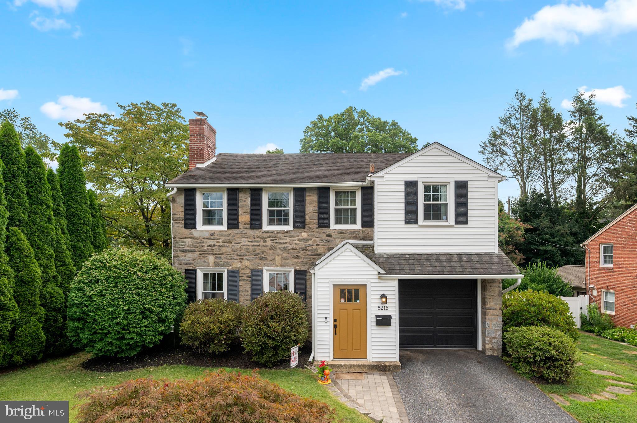Welcome to 5216 Reservation Road, a beautifully maintained classic stone colonial located in the desirable Aronimink Estates neighborhood of Drexel Hill. This charming home features a bright living room with three large windows, along with hardwood floors and deep window sills throughout. Walk in through the front entry, leave your shoes and backpacks. A spacious addition off of the dining room brings in abundant natural light through skylights and sliding glass doors, opening to a large fenced in backyard with a patio, perfect for entertaining or relaxing. The kitchen offers ample cabinet and counter space, and just off the kitchen is a bonus nook. Upstairs are four generously sized bedrooms, including a primary suite with its own full bath, plus excellent closet space and attic access for extra storage. The semi-finished basement adds flexible living space along with a dedicated laundry area. Aronimink Swim Club is within walking distance. Additional highlights include a prime location close to Aronimink Elementary School, shopping, restaurants, public transportation, major routes including 476 with easy access to Philadelphia. This is a rare opportunity to own a truly special home in a sought after neighborhood.