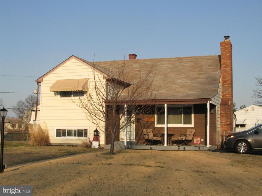 Meticulously maintained split level home on corner of cul de sac boasting covered front porch, newer wood flooring, living room fireplace, stainless appliances, and beautiful custom wood kitchen cabinets. Sunroom, rear deck, fenced yard and above ground swimming pool are an entertainers delight!.  Gorgeous family room / man cave with a bar and a lower level laundry are another featured treat!