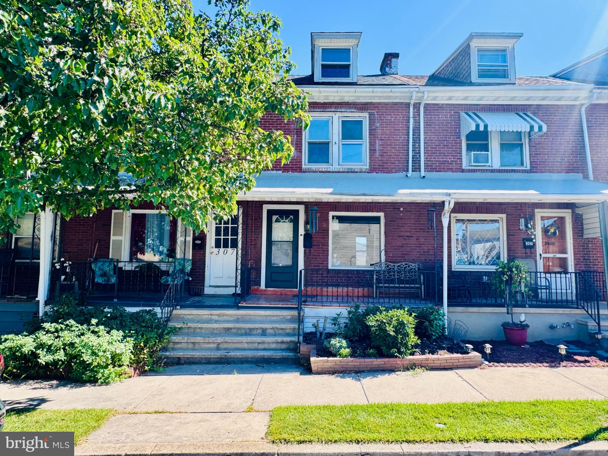 Fantastic West Reading, Wyomissing Schools 4 BR, 1.5 bath townhome in a prime, ultra convenient, quiet neighborhood on a no thru traffic street with just a short walk to all the restaurants, eateries, taverns, shopping and entertainment that West Reading has to offer. Major roads, schools and hospitals are just a short drive away. It really doesn't get any better than this. This beautiful, recently rehabbed townhome is loaded with updates and upgrades including a gorgeous brand new 18 handle modern kitchen with granite countertop, ceramic subway tiled backsplash, built in dishwasher, gas range/oven, double sink, new powder room, new full main bath with ceramic tiled tub surround, new LVP flooring throughout the entire main level and full bathroom on the 2nd level, new carpeting in all the bedrooms, most of the electric wiring, outlets and switches throughout have been replaced, and the entire home has been freshly painted, lots of new drywall, lots of new plumbing, replacement windows and new front shutters. There are 2 new front and rear main doors and storm doors as well. The semi-finished basement is clean, recently painted and provides the opportunity for additional living space or excellent storage. Mechanicals include a newer gas boiler, new in 2024 electric water heater, and 100 AMP electric service with a breaker box. The main roof is an architectural shingle roof and the rear is an asphalt rolled roof. For exterior enjoyment there's a covered front porch, cement covered rear porch, cement patio and large fenced yard with room to park a car at the rear of the yard with additional off street parking possible within the yard. Located in the highly acclaimed and much sought after Wyomissing School District, this turnkey beauty makes the perfect starter home or investment property.