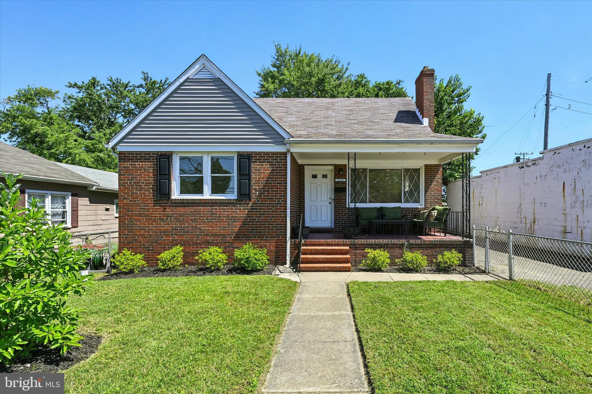 Welcome to 2512 N Point Road in Dundalk! This charming 4-bedroom, 2-bath brick Cape Cod offers both style and function. The home sits on a nicely landscaped lot with fenced front and rear yards, perfect for pets or play. A covered front porch provides a welcoming spot to relax, while the long, paved driveway offers parking for up to four vehicles.
Step inside to a bright and inviting living room featuring recessed lighting, updated flooring, a large picture window, and a cozy wood-burning fireplace with mantel. The dining area connects seamlessly to the kitchen, offering a comfortable space for meals. The kitchen has been updated with stainless steel appliances, gas cooking, modern lighting, and a convenient breakfast nook.
Two bedrooms, including the primary, are located on the main level for easy living. Upstairs, you’ll find two additional bedrooms with generous natural light, ample storage, and a dedicated zoned HVAC system for year-round comfort.
The finished lower level provides even more living space—perfect for a game room, home gym, or media area—and includes a full bath, laundry area, storage space, and walk-out access to the backyard.
Location perks: This home is close to waterfront parks, schools, shopping, and commuter routes, making it a great option for anyone who wants suburban living with easy access to Baltimore City and surrounding areas.
Move-in ready and well cared for—this one is ready to welcome you home!