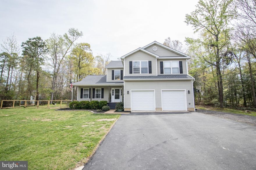 Tucked away on a peaceful 1-acre lot, this beautiful colonial offers the best of both worlds—quiet privacy with easy access to all points of interest. Lovingly maintained and full of charm, this home truly shines.

A welcoming front porch invites you into a bright two-story foyer filled with natural light. The main level features brand new LVP flooring throughout, brand new appliances and a great flow for everyday living or entertaining. To the left, you'll find spacious formal living and dining rooms that open up to a large kitchen and family room combination. From here, step out onto the custom deck—perfect for hosting or relaxing.

Upstairs, the primary suite features its own private bath, accompanied by three generously sized bedrooms and a full hall bathroom.

The finished basement offers even more space, including a full bathroom, a rec area, a cozy movie room, and a possible fifth bedroom—ideal for guests or a home office.

Outside, the backyard is a dream: expansive and flat, with a large shed for storage, a firepit area with pergola and built-in seating, and a deck that runs along the back of the home with plenty of room for grilling and entertaining.

This home is move-in ready and waiting to welcome its next owners!