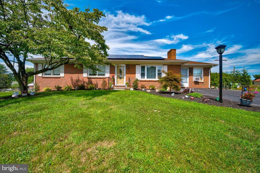 This all brick rancher offers 3 bedrooms, 1.5 baths.  Large living room with wood burning fireplace.   Kitchen with plenty of cabinet space. Dining area open to living room and sliding glass doors that lead to wonderful covered patio area.  Large family room and sunroom.  Laminate flooring on main level and hardwood in two bedrooms.  Large basement for recreation room and plenty of storage.  Fenced yard and shed in rear.  Save on electric with the solar panels.