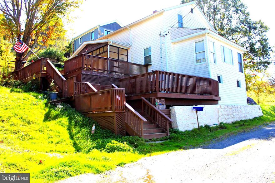 **PRICED TO SELL**  Great opportunity to own this property in the charming mountain town of Thomas, WV, and it is within walking distance to Front street. This home offers multiple decks to take in the views and watch the great Thomas Fourth of July fireworks. This charming 1900 home features 2 bedrooms and 1 full bathroom on the second floor, a large kitchen, pantry / bonus room, and half bath on the main floor, and lots of storage in the basement. This home is great for a full time residence, second home, or short term rental. Home is being sold As Is.