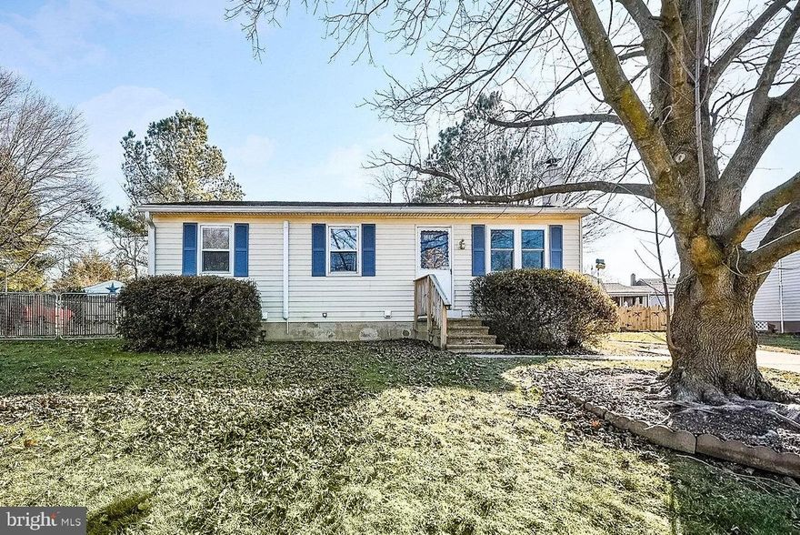 Enjoy the convenience of living on the MD/DE line. This move-in ready three-bedroom rancher offers a spacious family room with lots of natural light and an eat-in kitchen with ample cabinet space and island and has a glass sliding door that leads to the oversized deck and large, fenced yard. There is an additional side door from the kitchen to the driveway for convenience. Features three spacious bedrooms and an updated hall bath. A full basement offers plenty of storage space and could be finished for additional living space. Mini splits are included and offer heat and A/C for efficiency. The basement also has a wood stove and direct, exterior access. Close to U of D and great restaurants and shops in downtown Newark.