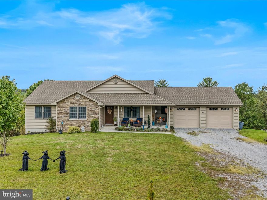 Discover the perfect blend of MODERN COMFORT and RUSTIC CHARM at 45 Providence Court, a beautifully crafted 3-bedroom, 3.5-bathroom home in Berkeley Springs, WV. This new listing showcases exceptional attention to detail throughout its thoughtfully designed spaces. The heart of the home features a stunning kitchen equipped with rich hickory cabinetry and elegant quartz countertops, creating an ideal space for culinary adventures and entertaining. The main level flows seamlessly with gorgeous hickory flooring that adds warmth and character to every room. Cedar ceilings provide a distinctive architectural element that enhances the home's natural appeal. The living room centers around a cozy gas fireplace, perfect for relaxing evenings with family and friends. Recessed lighting throughout creates a warm, welcoming ambiance while highlighting the home's beautiful finishes. The primary bedroom serves as a true retreat, featuring two generous walk-in closets that provide ample storage solutions. Step directly from the primary suite onto the rear deck, where you can enjoy peaceful morning coffee or evening relaxation in your private outdoor space. Built with quality 2"x6" wall construction, this home offers superior insulation and durability. The attached 2-car garage includes insulation in both walls and ceiling, ensuring comfort during harsh winter months. Outdoor living reaches new heights with the delightful 12'x16' screened-in porch, ideal for enjoying fresh air while staying protected from insects and weather. The basement level transforms typical storage space into functional living areas. Current configurations include versatile bonus space serving as both an office and music room. The music room captivates with distinctive barnwood walls and strategically placed windows that create an inspiring creative environment. The basement bathroom impresses with a luxurious large walk-in shower, while an additional 34'x24' garage provides exceptional storage capacity for vehicles, equipment, or workshop needs. Located in the charming Breezy Ridge Estates, this property offers convenient access to local amenities while maintaining a peaceful residential setting. The area is known for its natural beauty, historic attractions, and welcoming community atmosphere. This exceptional home combines quality construction, thoughtful design, and practical amenities to create a truly special living experience. From the elegant hickory and quartz kitchen to the versatile basement spaces, every detail has been carefully considered to enhance daily life. Whether you're drawn to the rustic cedar ceilings, the convenience of heated garage spaces, or the creative potential of the music room, this property offers something special for every lifestyle need. Schedule your showing today!