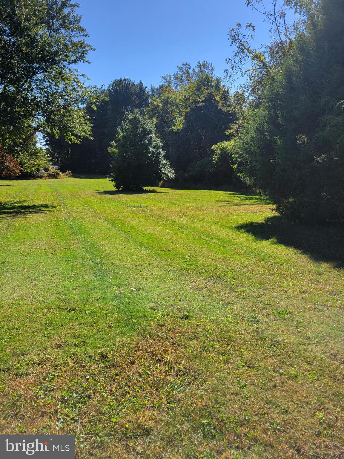 This 1.7-acre lot is a remarkable opportunity to own a piece of land in the highly sought-after Glen Arm area. With its generous size and flat, usable terrain, it offers endless possibilities for your dream home. The absence of a builder tie-in gives you the freedom to choose your own builder and design the perfect residence to suit your needs and preferences.
Located in the charming Glen Arm community, this property provides easy access to the serene beauty of the Loch Raven Reservoir (1 mile away), making it an ideal location for nature enthusiasts and outdoor lovers. The reservoir offers a wide range of recreational activities, including hiking, fishing, and picnicking, allowing you to enjoy the tranquility of the natural resources. If you're seeking a peaceful retreat or a place to build your forever home, this 1.7-acre lot in Glen Arm presents an exceptional opportunity to create your own oasis in a picturesque and highly desirable location. 5 minute drive to 695 (Cromwell Bridge exit)
Lot is located next to rancher at 4301 Northcliff Road and 12111 Manor Road. Sign on property.