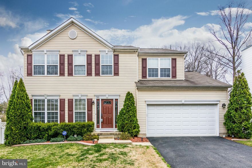 This home shows like a model & is move in ready.  Main level features hard wood floors, wood burning fireplace, & stainless appliances.  The basement is perfect with bar and theater room w/multi level seating & built in speakers. The master suite has two walk in closets, a super bath with dual sinks, soaking tub & separate shower.  Fenced level yard w/maintenance free deck &  patio.  A Perfect 10!