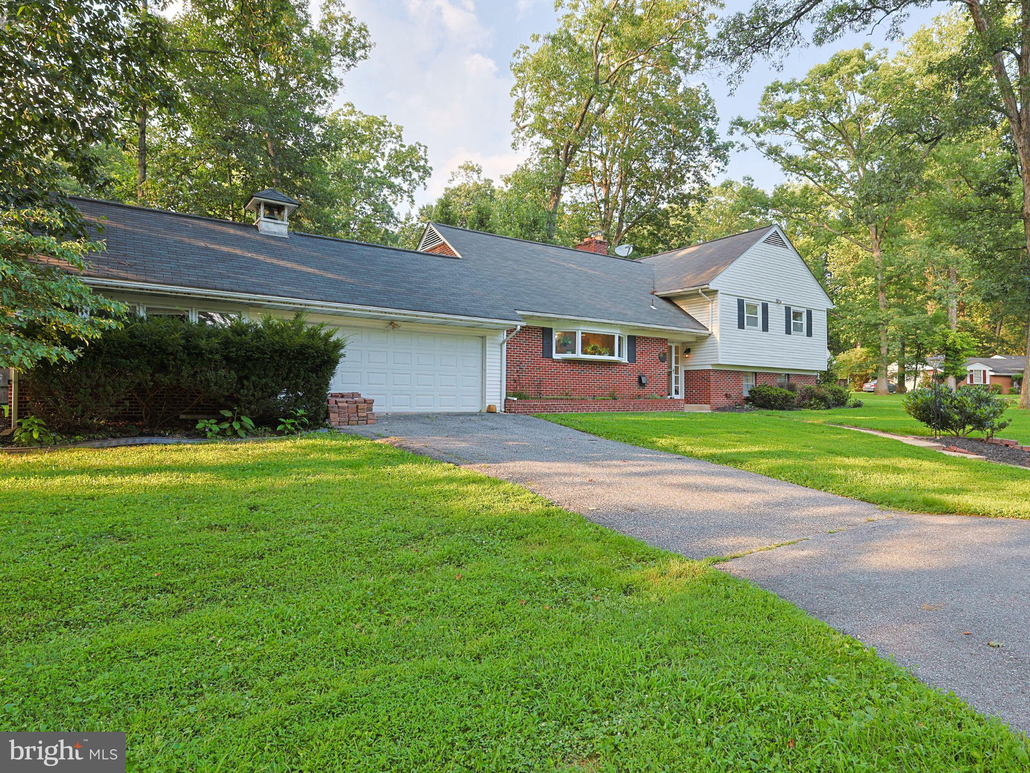 Welcome to this move-in ready 3-bedroom, 2-bath single-family home in the sought-after Hernwood Heights community of Randallstown. Offering over 2,500 finished square feet on a spacious 0.44-acre corner lot, this home provides the space, flexibility, and comfort today’s buyers are looking for.
Enjoy the charm of the original hardwood floors, bright and open living spaces, and generously sized bedrooms. The main level features a large living/dining area with a warm wood vaulted ceiling and hardwood floors. The fireplace with brick hearth adds to the beauty of the space. The large, eat-in updated kitchen boasts upgraded granite counter tops, 36" cabinetry, ceramic tile flooring, stainless steel appliances, coffee nook. Enjoy the natural sunlight with the picturesque views of the front lawn. The spacious lower level offers a versatile layout—perfect for a home gym, rec room, office, or private guest room. The projector conveys with the sale! This home is ideal for multi-generational living, work-from-home setups, or buyers needing extra room to grow.
Outside, the expansive corner lot provides plenty of room to entertain, garden, or simply relax in your private yard. Gardening is made easy with the attached sunroom, perfect for potting plants or enjoying morning coffee! Conveniently located near shopping, dining, parks, and commuter routes. Whether you're a first-time buyer, looking to move up, or searching for a home that can accommodate extended family, this property delivers the lifestyle you want—right where you want to be.