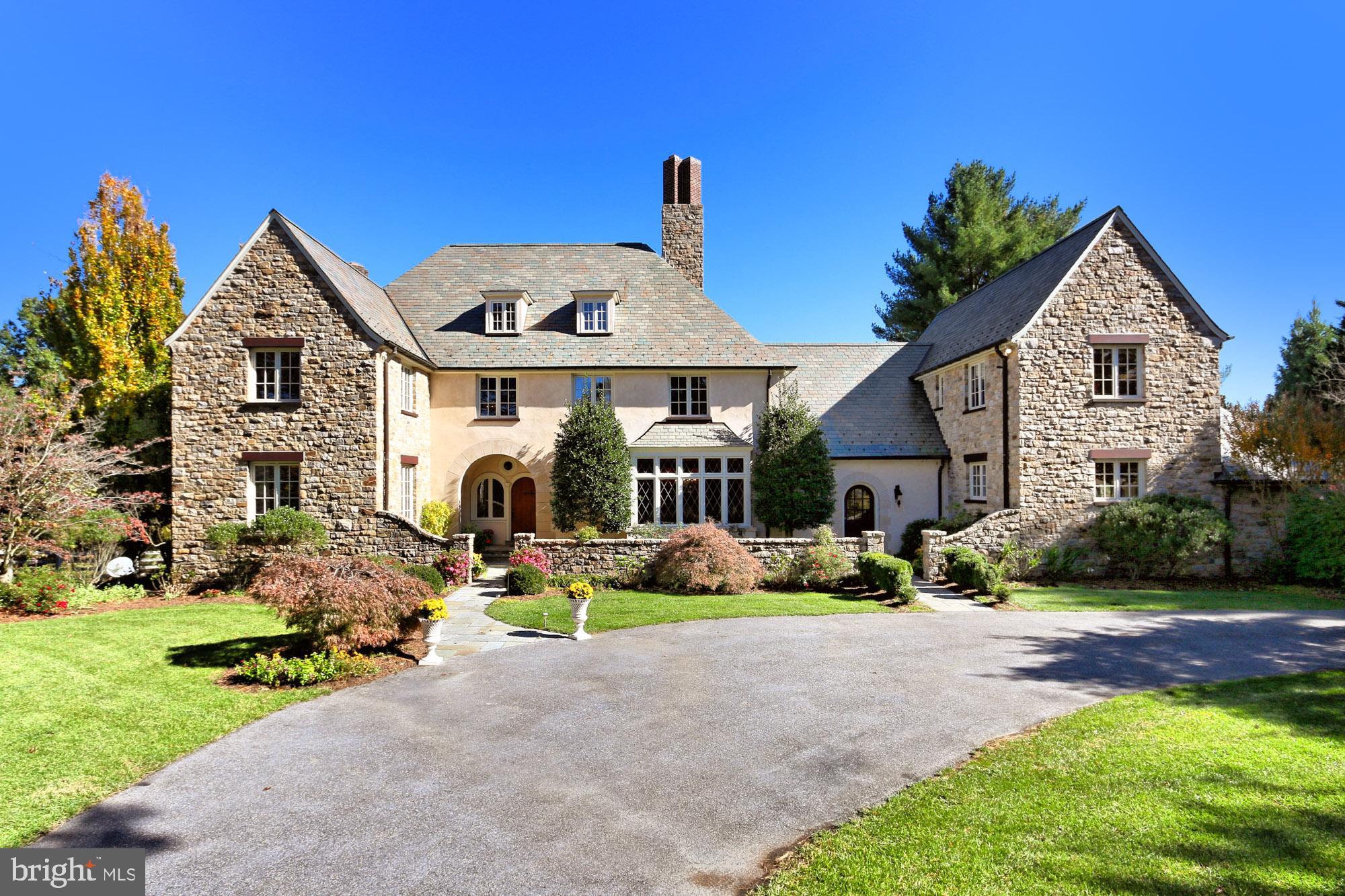 OPEN SUNDAY JUNE 28TH 1-3PM MASKS REQUIRED...Welcome to 10720 Red Barn Lane in Potomac, Maryland! This exquisite Tudor-style 5 bedroom,5 full & 2 half bath custom luxury home is infused with architectural design & details on an amazingly landscaped 2.1-acre lot with majestic views. An authentic stone and stucco exterior, 3-car garage within-law suite, 200-year slate roof, beautiful flagstone patios, outdoor grill, & a separate indoor basketball hoop are only some of the fine features that make this home so appealing. Abounding with all the modern luxuries homebuyers seek, the list of exquisite details and intricate designs both big and small is endless, making it more than just a home...it s an experience and not soon to be forgotten! *** A grand foyer with prominent staircase, arched entryways, and herringbone wood flooring welcomes you home *** A banquet Sized DR****Sunny LR***FR w/Stone FP***Executive Office***Sunroom w/Panoramic Views**A Butler's Pantry *** Gourmet kitchen ***2 Powder Rooms & Mudroom*** Expansive flagstone patio with outdoor grill,and steps down to a second patio and lush grassy expansive yard*** Upstairs Owner s suite boasts a separate sitting room & two walk-in closets! Down the hall, three bright and spacious junior suites each enjoy access to a full bath, while a bedroom-level laundry room eases the daily task.**** Accessed by a private staircase, the other side of the second floor offers an in-law suite with two bedrooms and a full bath. ***** The expansive walkout lower level has space for a multitude of activities including a pub-style wet bar, tiered media area, and indoor basketball half court making for easy entertaining. A spacious room with full closet and connecting full bath with steam shower add the versatile space to tailor and meet the demands of your lifestyle. his home sits in one of the loveliest estate communities in the heart of Potomac and is super convenient to Bethesda,Upper Montgomery County, DC, and Virginia. It is well positioned in one of the best school districts in Montgomery County and super convenient for outdoor enthusiasts. You will love the nearby Watts Branch Park, Falls Road Golf Course,many horse farms in the area, and you can choose to wind down at the many fine local wineries and breweries where tastingsand special events are offered throughout the year. For a suburban retreat that offers sophistication and comfort with all the modern luxuries, come home to Red Barn Lane!