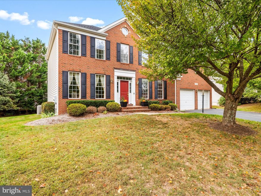 Welcome to this beautiful brick-front colonial in highly sought-after Kingsview Village just steps to Matsunaga ES and Germantown Park! The original owner has thoughtfully and tastefully updated the home through the years and it's ready for a new owner.  As you approach, you immediately notice the new architectural roof(2024), charming front porch and immaculate brick-front appeal. Step inside to an inviting two-story foyer and perfectly conditioned hardwood floors, flowing throughout the main level. The recently updated eat-in kitchen features stainless steel appliances, a center island with pendant lighting, updated countertops and seamless flow to the light-filled family room. The family room is the heart of the home with large windows and a cozy gas fireplace.  Gather here, just in time for the holidays! A front office, formal dining room adorned with timeless wallpaper, abundant living room and powder room complete the main level.  The laundry room is on the main level as well for convenience. Upstairs, you will appreciate NEW carpet throughout. The spacious primary suite includes a walk-in closet with custom shelving and a private bath with dual vanities, a soaking tub, and a separate shower. The primary suite bath has been renovated and exudes luxury. Three additional generously sized bedrooms upstairs share a full hall bath. The unfinished lower level offers endless potential for customization or abundant storage. Enjoy outdoor living on the large deck and flagstone patio overlooking a peaceful, tree-lined backyard. The attached two-car garage and driveway provide ample parking. Kingsview Village residents enjoy outstanding amenities, including a community pool, clubhouse, tennis courts, walking trails, and tot lots. Conveniently located near major commuter routes, schools, parks, the Maryland SoccerPlex, Germantown Splash Park, shopping, and dining. Welcome home!