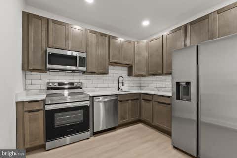 Townhouse For Sale - 2117 Clifton Avenue<br/> BALTIMORE, MD 21217